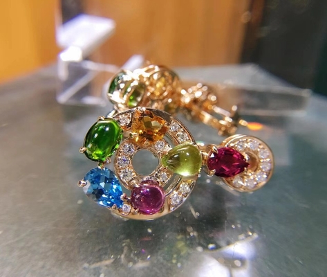 Astrale earrings 18k yellow gold set with blue topaz, green tourmaline, peridot, citrine and red garnet set with diamond